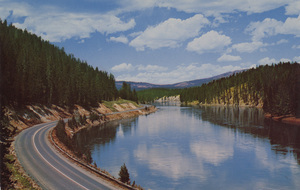 Postcard of the Yellowstone River in Yellowstone National Park, Wyoming. | Yellowstone River, Yellowstone National Park, Wyoming. Largest and most scenic of the many magnificent streams found in the Park, Yellowstone River heads high along the continental divide in Wyoming. Flowing into Yellowstone Lake from which it emerges at Fishing Bridge it meanders placidly through beautiful Hayden Valley only to plunge with an earth-shaking roar in two breath-taking waterfalls into he depths of the Grand Canyon of the Yellowstone.