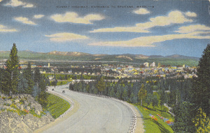 Postcard is a view of the Sunset Highway leading into Spokane, Washington.  | Spokane, rightly called the "Empire City," is strategically located in the heart of the great Pacific Northwest. It is exceptionally rich in agriculture, timber, minerals, live stock, fruit and water power, normally producing more than $400,000,000 in new wealth each year.
