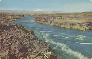 Postcard is a photograph of the Columbia River. | Columbia River, boundary between the states of Oregon and Washington, has carved through the heart of the Cascade Mountains one of the world's most beautiful gorges. Famous Columbia River Highway on the north shore passes a dozen lovely waterfalls including the 620-foot high Multnomah Falls. Union Oil Company's Natural Color Scenes of the West. Tour the west with 76 gasoline.