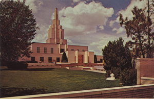 Postcard of a Mormon temple in Idaho Falls, Idaho with a woman sitting on the grass. | L.D.S. "Mormon" Temple, Idaho Falls, Idaho.