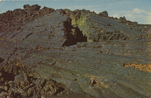 Postcard of lava flows at the Craters of the Moon National Monument, Idaho.  | Craters of the Moon National Monument, Idaho. Pressure ridge - Movement and settling of bonded lava caused the weakened surface crust to buckle and crack, forming ridges which range from 8 to 15 feet high.