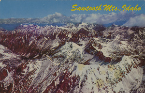 Postcard of the Sawtooth Mountains in Idaho.  | "Rugged Sawtooth Peaks" in the primitive area of the Sawtooth National Forest.