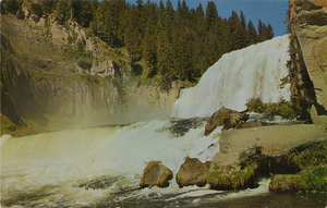 Postcard of Upper Mesa Falls near Ashton, Idaho.  | Upper Mesa Falls. This 106' drop makes one of the largest falls of the mighty Snake River, which flows through Idaho before joining he Columbia River.