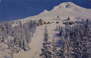 Postcard is a winter scene of Timberline Lodge on Mt Hood, Oregon. | Timberline Lodge, Oregon. Nestled at the edge of the timberline on the southern slopes of Mt. Hood, Timberline Lodge offers winter and summer recreation for the skier or tourist. Hand-hewn from great logs, it is a monument to the Forest Service and W.P.A. labor, which erected it.