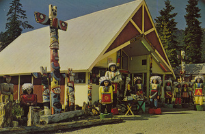 Postcard of the Rock Chalet building at Snoqualmie Pass in Washington state.  |  Rock Chalet, Snoqualmie Pass, Washington. The world's largest collection of hand-carved king-sized wooden Indians can be seen at this landmark at the summit of Snoqualmie Pass on U.S. Highway No. 10, about 50 miles east of Seattle. More Indians are at the Summit Inn directly across the highway.