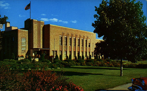 Postcard of the Stevens County Courthouse in Coville, Wash. | A Modern City of 4,000 population situated in the heart of the scenic Colville Valley.