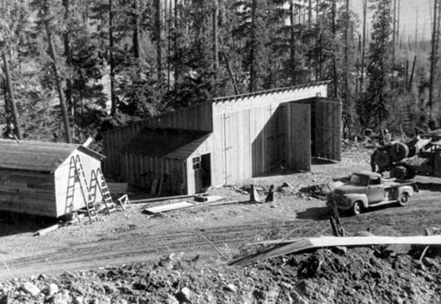 Construction of buildings at a logging camp. Donated by Speed Weidner through Priest Lake Museum.