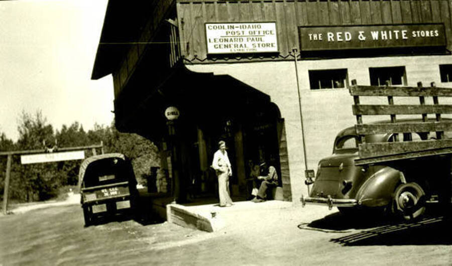 Side view of the Leonard Paul store with a CCC truck parked out front. Donated by Marjorie Paul Roberts via Priest Lake Museum.