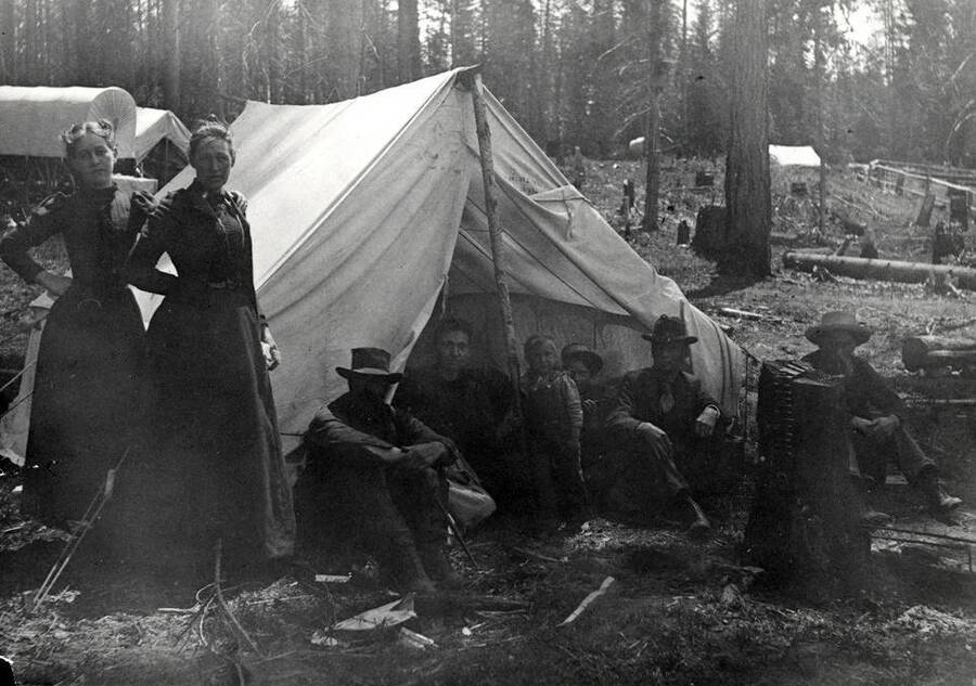 The E. S. Burgan Family camping in the forest.