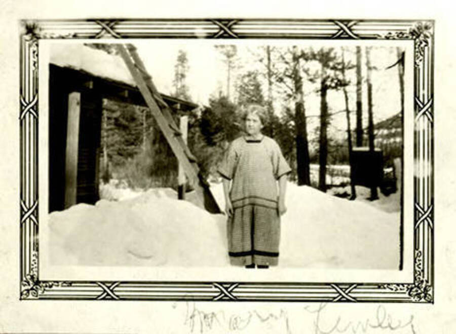 Mary Lemley standing outside a building in the winter. Donated by Harriet (Klein) Allen via Priest Lake Museum.