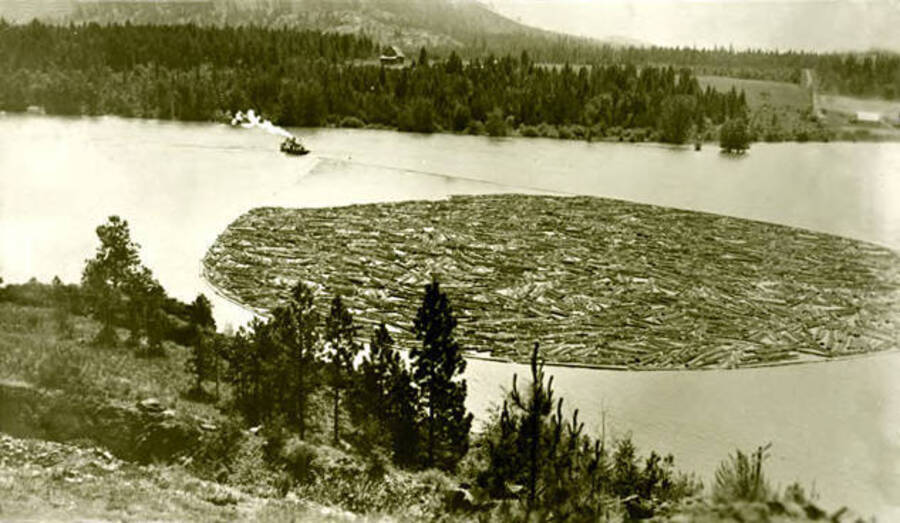 The S. S. Rustler collecting logs on Lake Pend Oreille, Idaho. Donated by Russ Bishop through Priest Lake Museum.