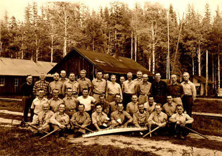 Group of German internees (POWs?) with axes and saws. Donated by Red Gasterneau through Priest Lake Museum.