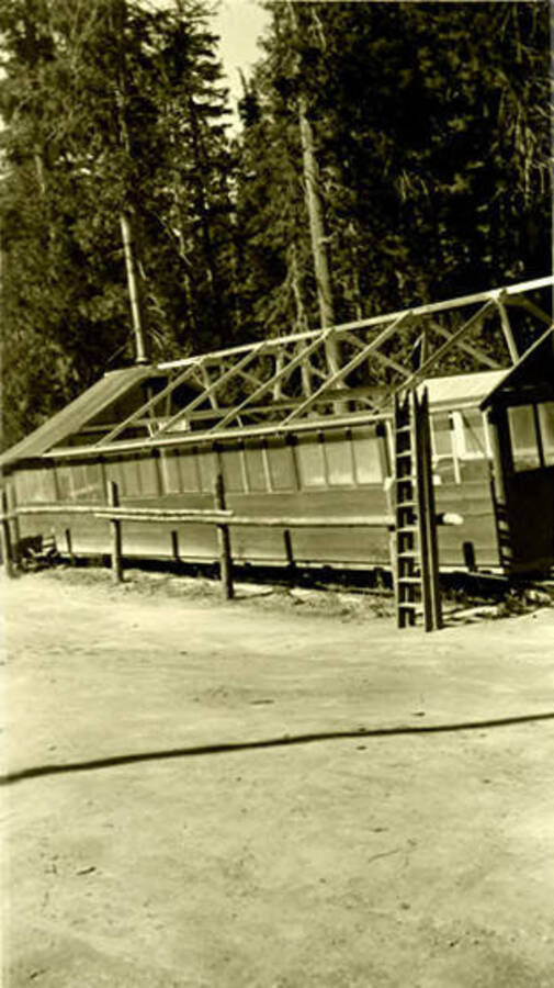 A building prepared to install a tarp roof. Donated by Red Gasterneau through Priest Lake Museum.