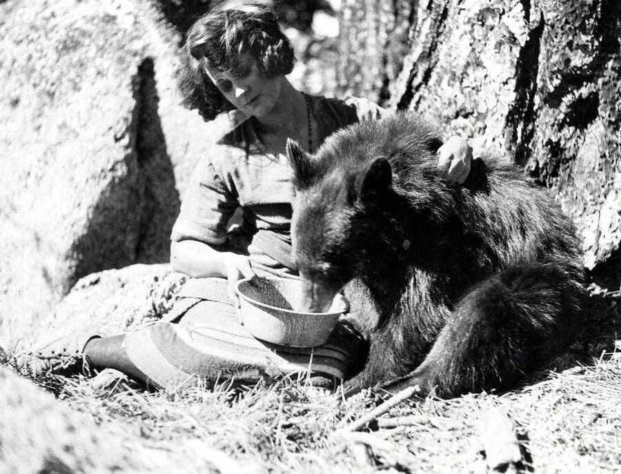 Nell Shipman feeding a black bear.