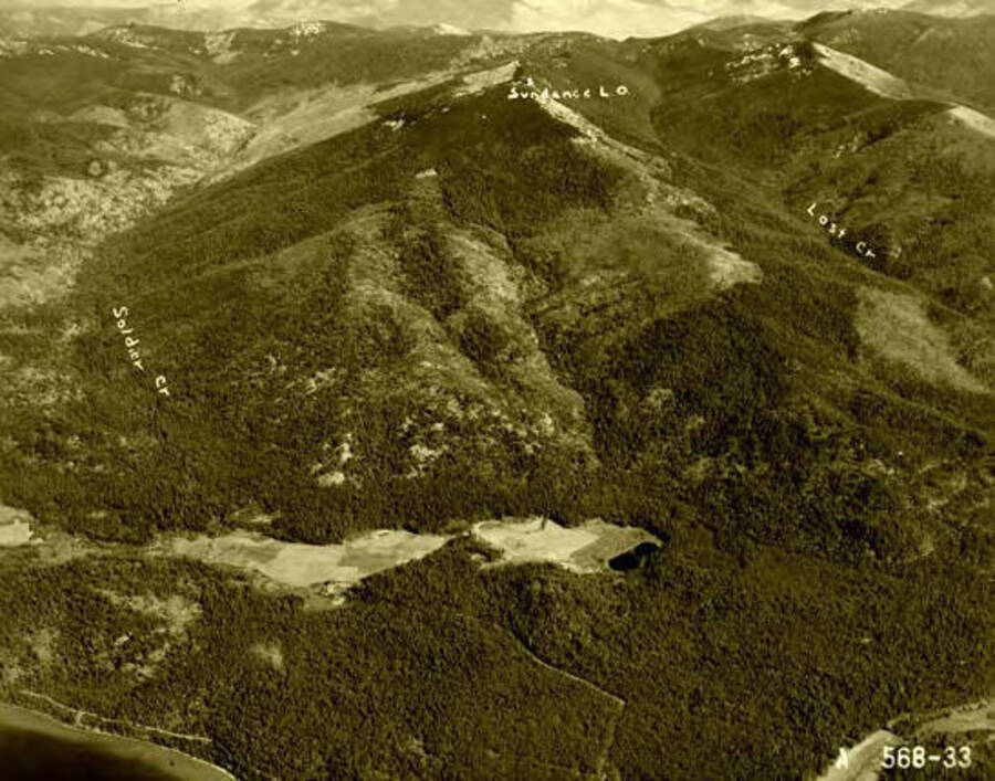 Aerial view of Lee Lake with Sundance Mountain in the background. Donated by Red Gasterneau through Priest Lake Museum.