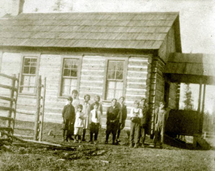 Eleven children stand outside the Nordman School in Nordman, Idaho. Donated by Rose Meyerl through Priest Lake Museum.