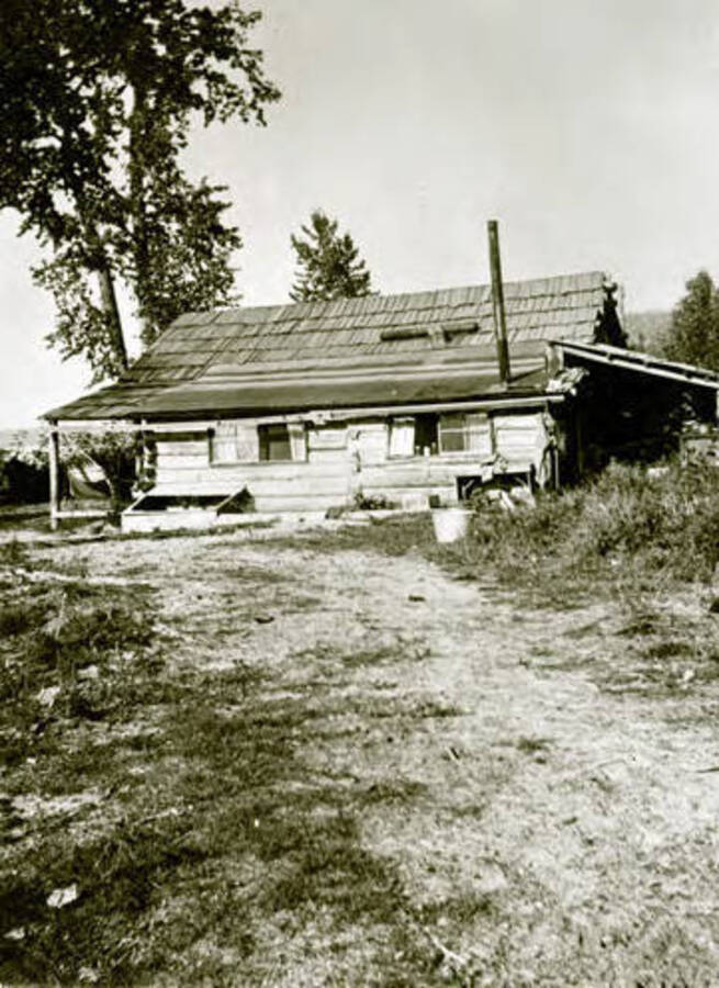 Side view of Warren homestead on Priest Lake, Coolin, Idaho. Donated by William Warren through Priest Lake Museum.