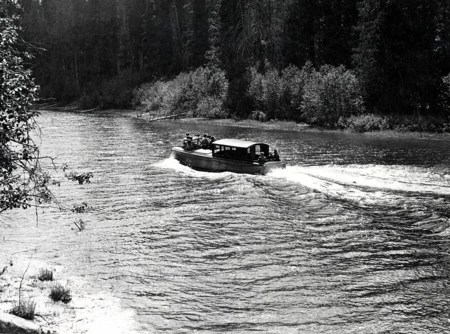 Boat Kaniksu traveling up the Thorofare River. This joins Priest Lake and Upper Priest Lake, Idaho.