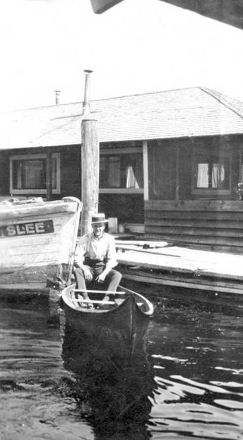 Jimmy Fallis next to the steamboat W. W. Slee. Donated by Mike Winslow through Priest Lake Museum.
