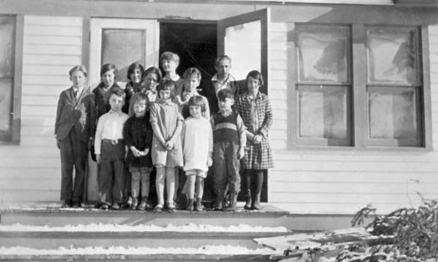 Thirteen students pose on the steps of Nordman School in Nordman, Idaho. Donated by Mike Winslow through Priest Lake Museum.