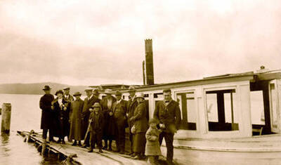 Passengers in front of boat on the way to Nell Shipman camp. Donated by Viv Beardmore through Priest Lake Museum.