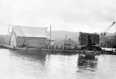 View of dredging the Thorofare River which connects Priest Lake and Upper Priest Lake. Donated by H. J. Deiner through Priest Lake Museum.