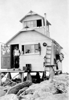 Rex Stuart, of Newport, at the Lookout Mountain lookout. Donated by H. J. Deiner through Priest Lake Museum.