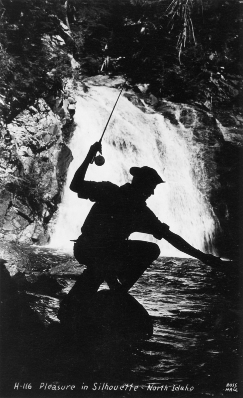 A person is silhouetted while fishing in front of a waterfall in a rocky, wooded area. The figure is holding a fishing rod, with one arm extended toward the water. The text at the bottom reads: "H-116 Pleasure in Silhouette - North Idaho." In the bottom right corner, it reads: "ROSS HALL."
