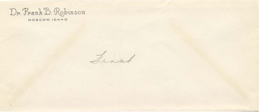 An unaddressed envelope with the preprinted return address of Dr. Frank B. Robinson, Moscow, Idaho. 'First' is written on the envelope in pencil.