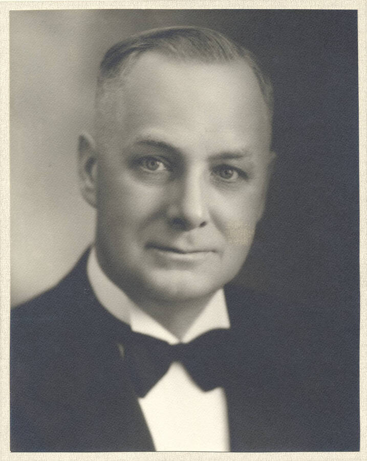 Portrait of middle-aged Frank B. Robinson in tuxedo and bowtie.