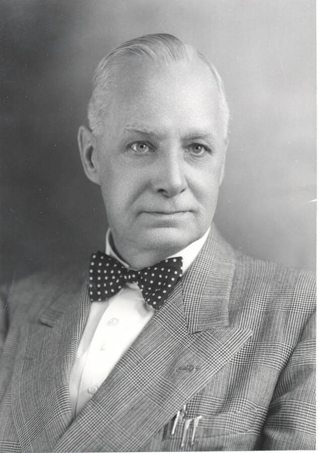 Portrait of older Frank B. Robinson in suit and bowtie