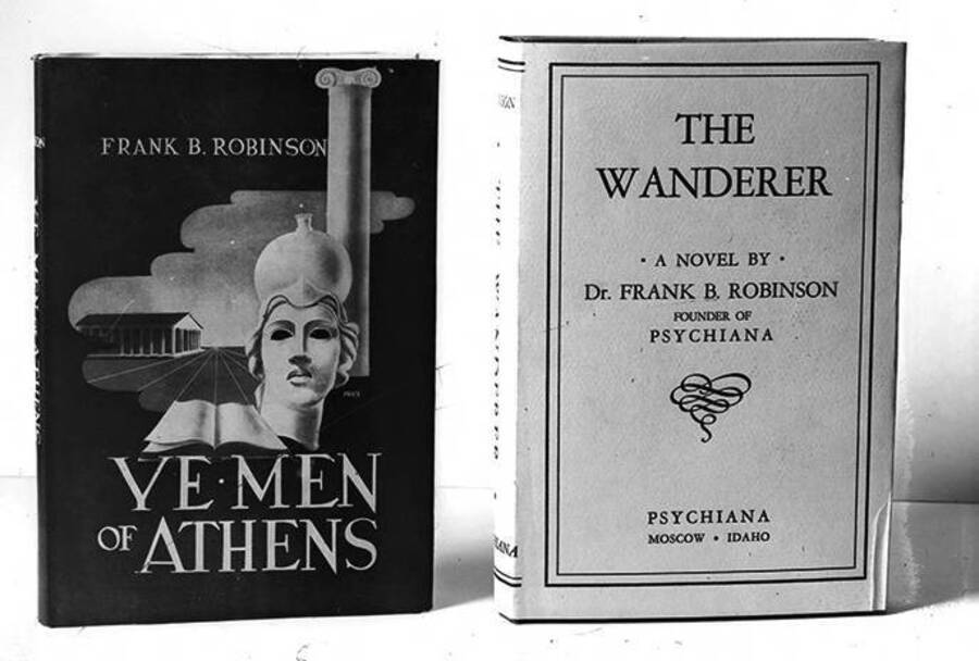 Negative photograph of the covers of Frank B. Robinson's books Ye Men of Athens, which depicts an Ancient Greek building, statue, and column, and The Wanderer, which includes text only. Both published by Psychiana, Inc.