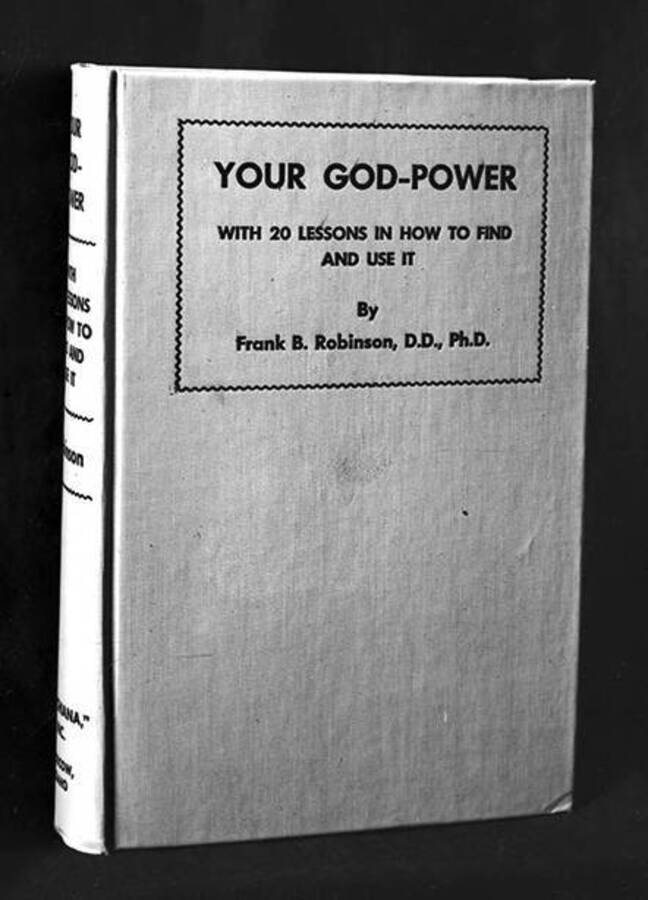 Negative photograph of the cover of Frank B. Robinson's book Your God-Power, which includes only the text of the title and the author's name and credentials.