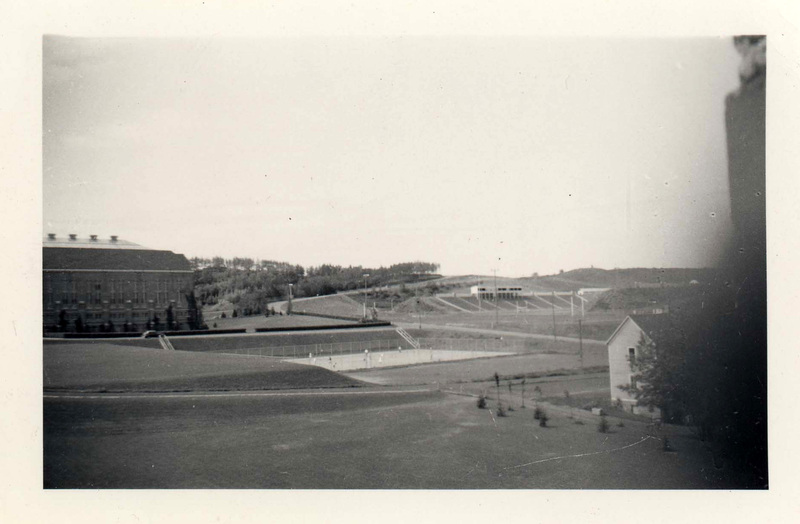 Fields with Neale Stadium (upper Right) and Memorial Gym (Center left) unknown white building (lower right), and a tennis court (center).