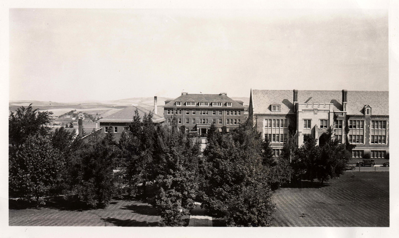 Taken from Administration Building with trees and lawn in foreground, Morrill Hall (Center), Life Sciences South (Right), and College of Art and Architecture (left).