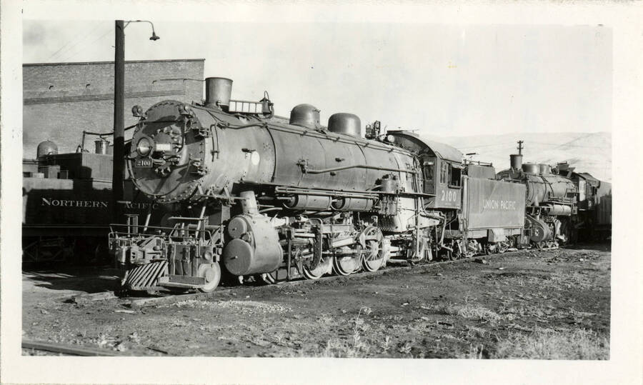 A photograph of Union Pacific Train Engine 2100 'McArthur' class (a Mikado re-named after Pearl Harbor). Oil burner, mainly when used on Headquarters Branch to help avoid fires.