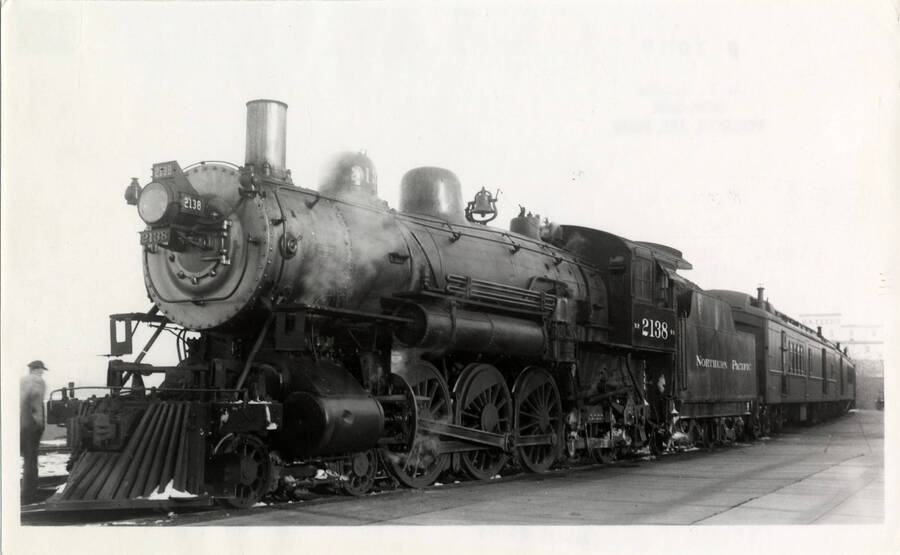 A photograph of Northern Pacific Train Engine Q-1 2138, of which connected with the Camas Prairie passenger trains. This specific train engine operated on the Spokane-Lewiston route.