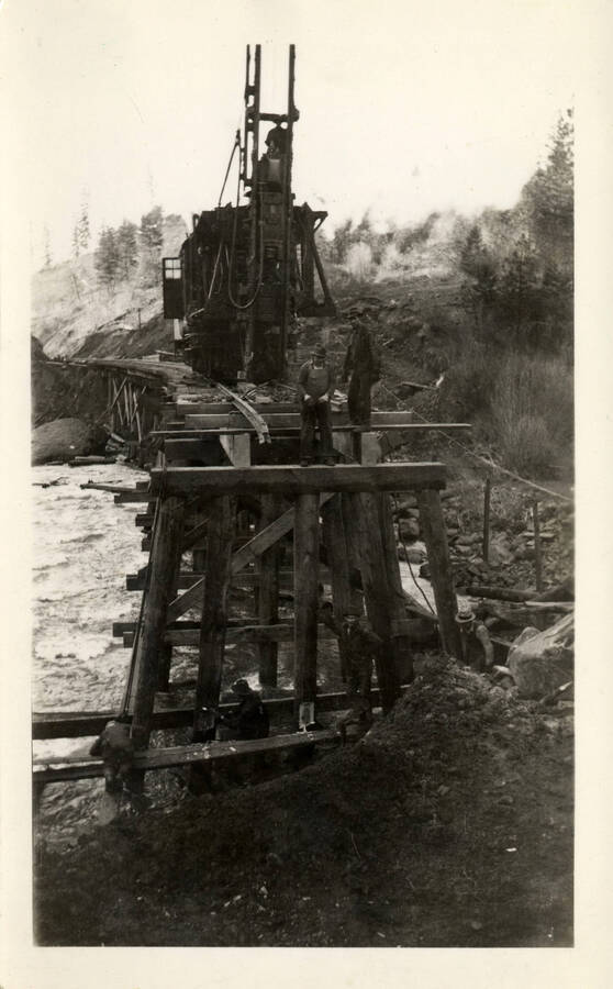 A photograph of the beginning processes of building Bridge 5 crossing Orofino Creek.
