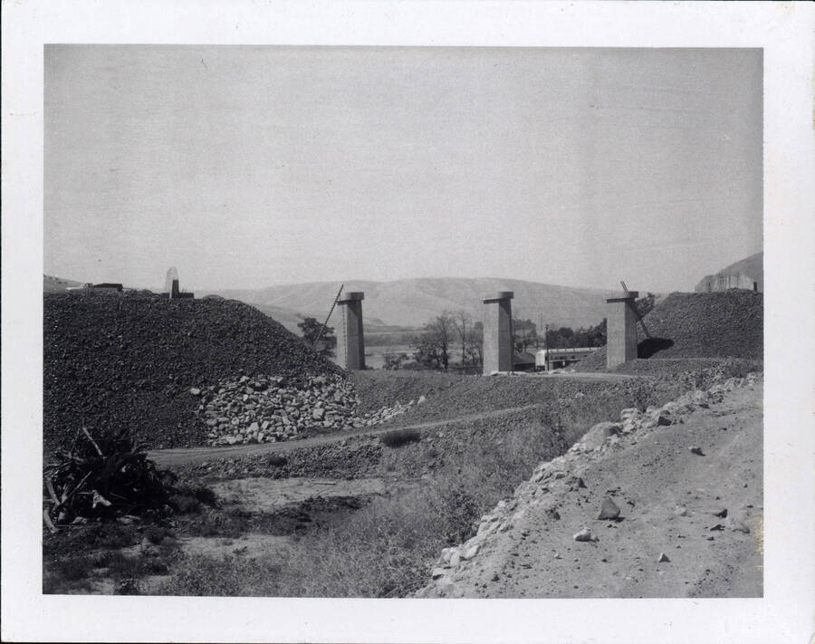 A photograph of a partially constructed Wawawai Bridge. You can clearly see the Almita Drain Channel that the bridge plans to cross.