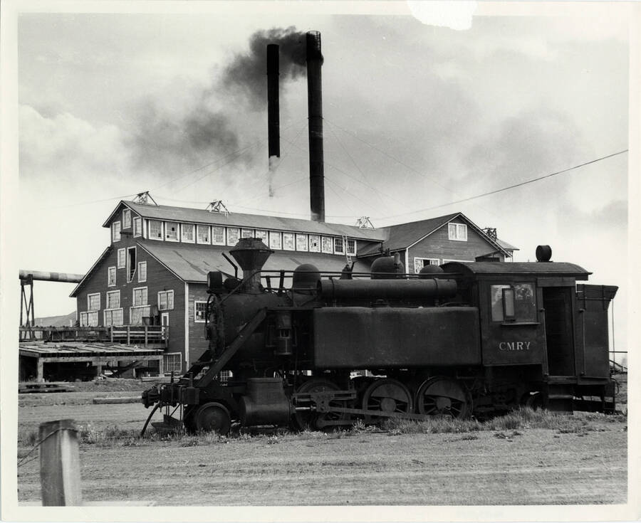 A photograph of a stationary train engine located near Craig Mountain Lumber Co. Mill.
