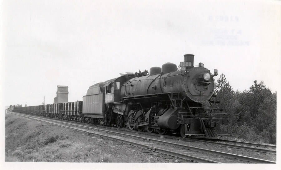 Northern Pacific Train Engine 1521 in two at Reubens, carrying freight as well as Train Engine no. 4.