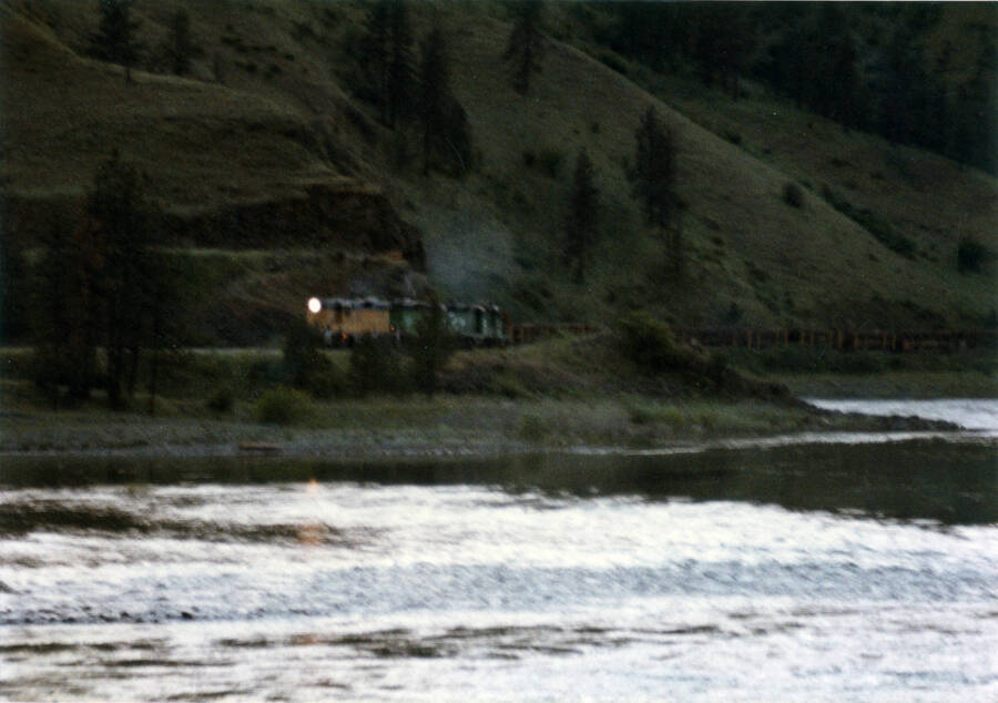 A photograph of Train #885 (night logger) Camas Prairie First Subdivision at mile post 3.