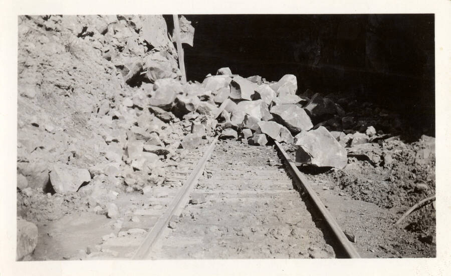 A photograph of the aftermath of a rock slide just outside Tunnel #7 on the Camas Prairie Railroad.
