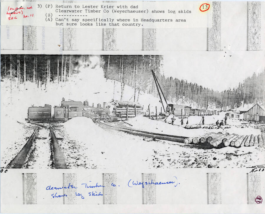 A paper copy of a photograph of a timer train belonging to Clearwater Timber Co. in Headquarters, Idaho.