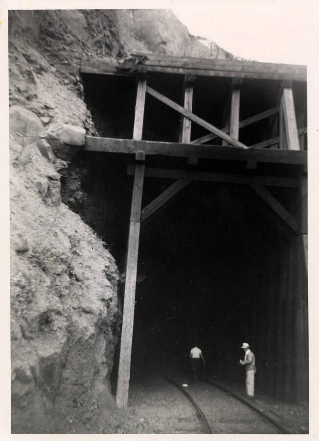 A photograph of Tunnel No. 7 on the Lapwai Branch of the Camas Prairie Railroad. This perspective shows the scaffolding of the outside of the tunnel.