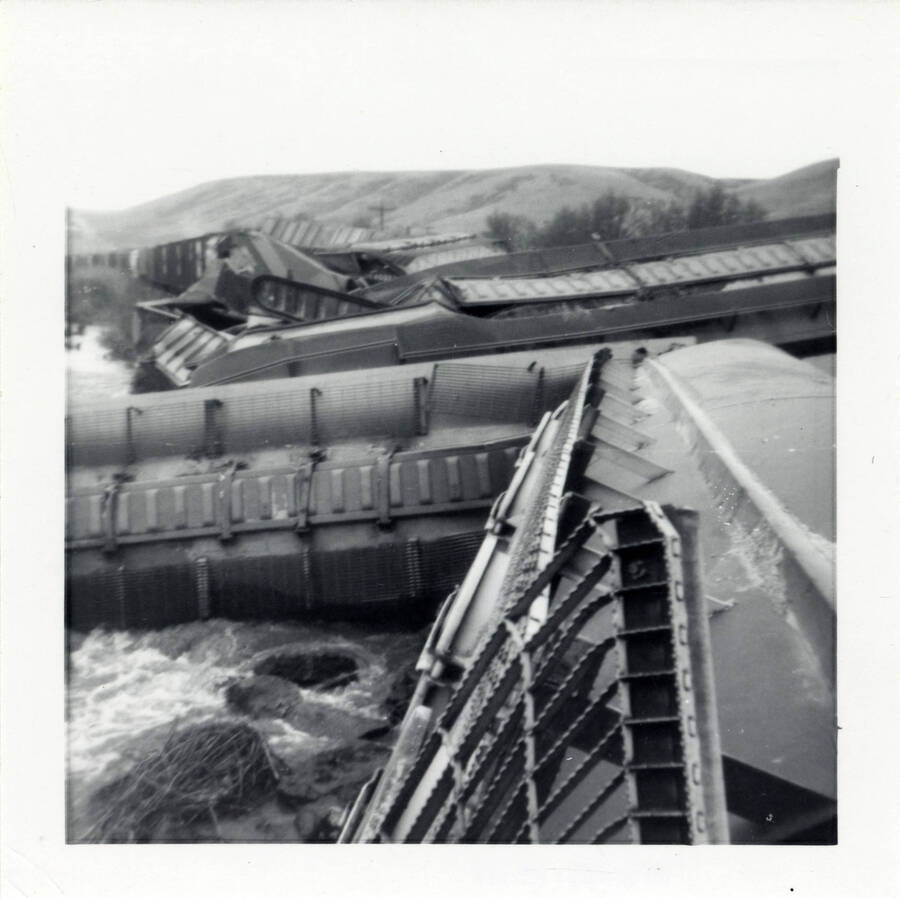 A photograph of the wreckage of M.P. Train 2.5 near Lapwai, costing $5500. The amount of cargo damaged appears to be immense.