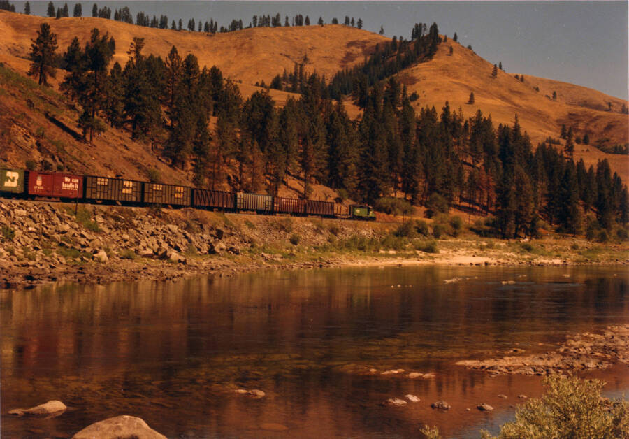A photograph of Kamiah Local Train Eastbound at milepost 45, first subdivision between Orofino and Kamiah.