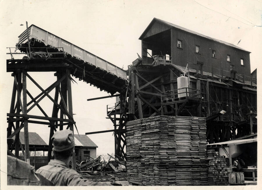 A photograph of a train engine crash caused because of rotten wood in some scaffolding at Lewiston Yards.
