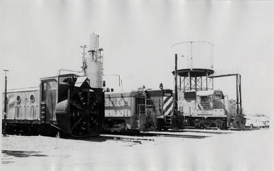 The ex-GN rotary assigned to the Camas Prairie dozes in the afternoon sun in the company of a UP EMD yard switcher, a BN Geep assigned to Camas Prairie road jobs, and a UP GP38-2 used on the "mainline" connection between Lewiston, Idaho and the Union Pacific's yard at Hinkle, Oregon.