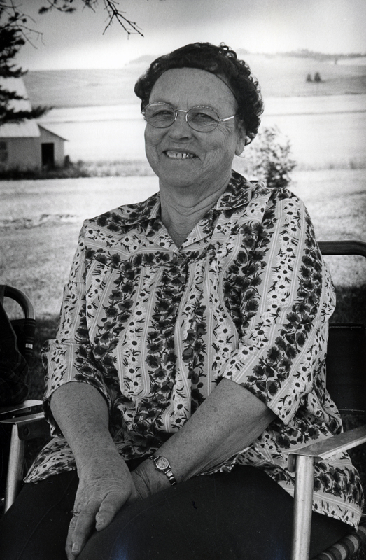 Photograph of Pearl Gaynor Choate sitting, smiling at the camera.